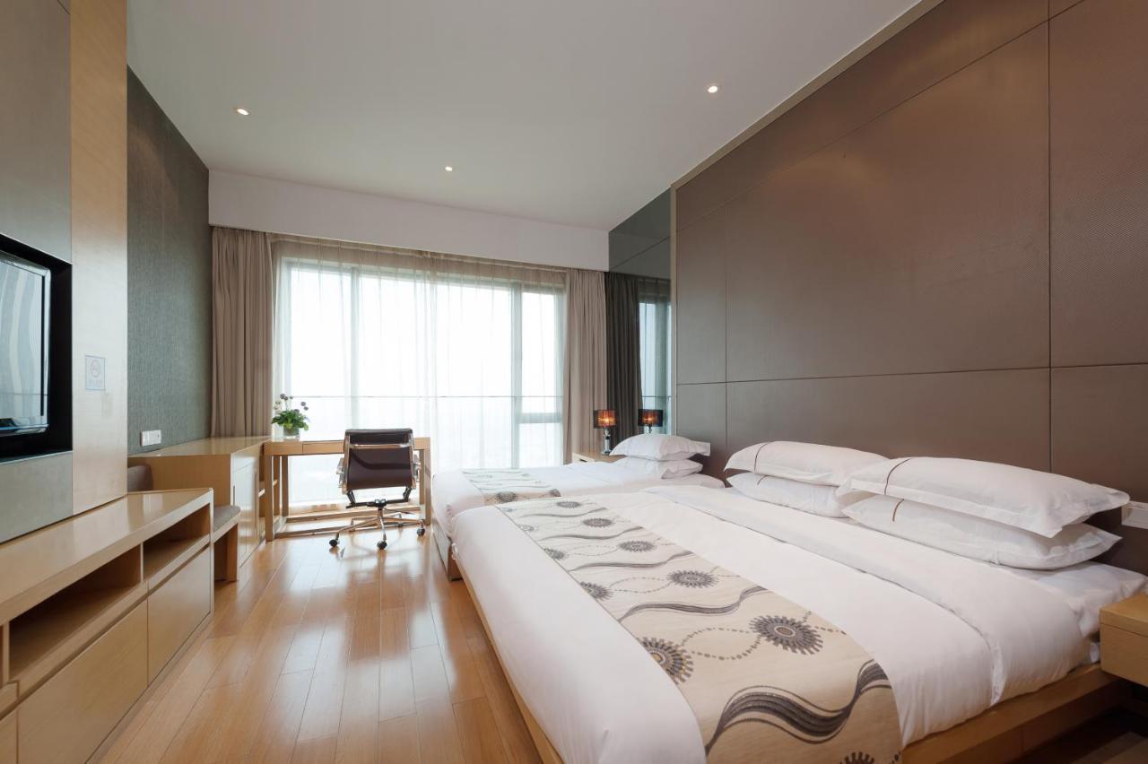 Yicheng Pazhou Poly World Trade Centre Apartment Kanton Exterior foto