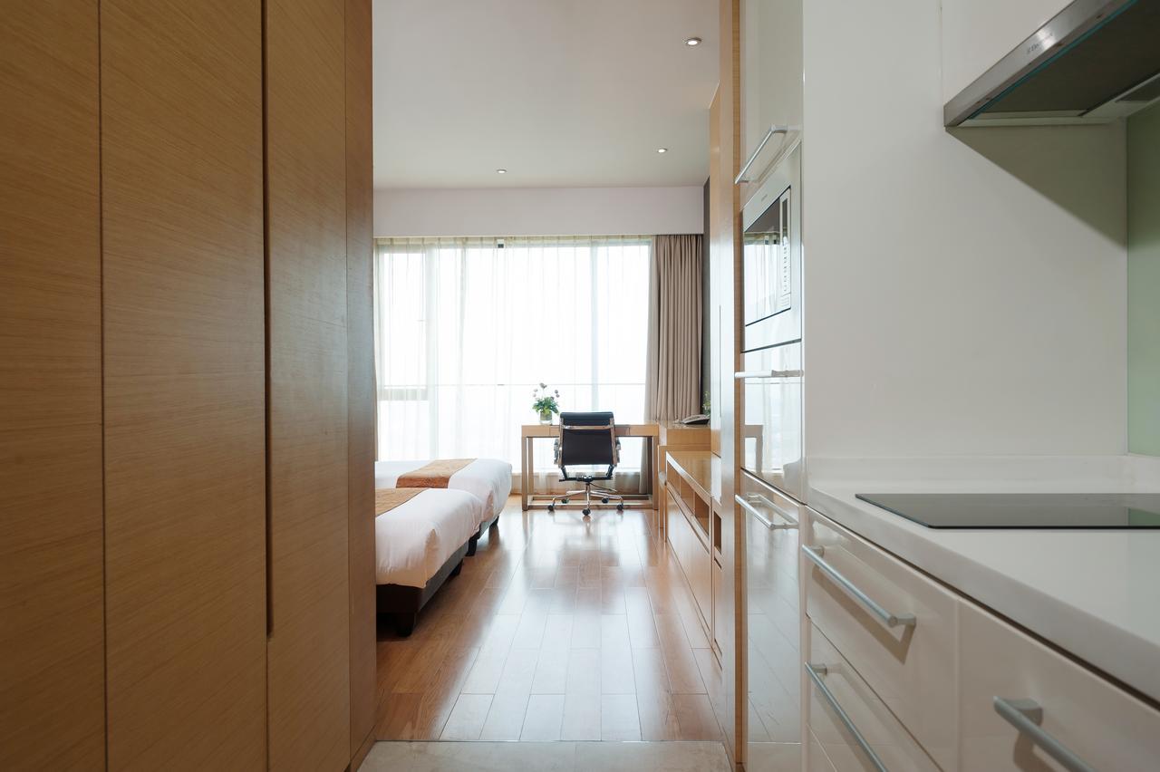 Yicheng Pazhou Poly World Trade Centre Apartment Kanton Exterior foto